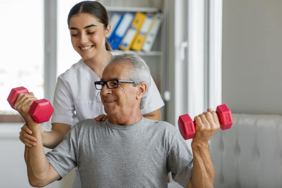 Physical Therapist Helping Patient