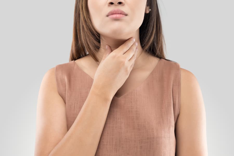Woman Feeling Neck
