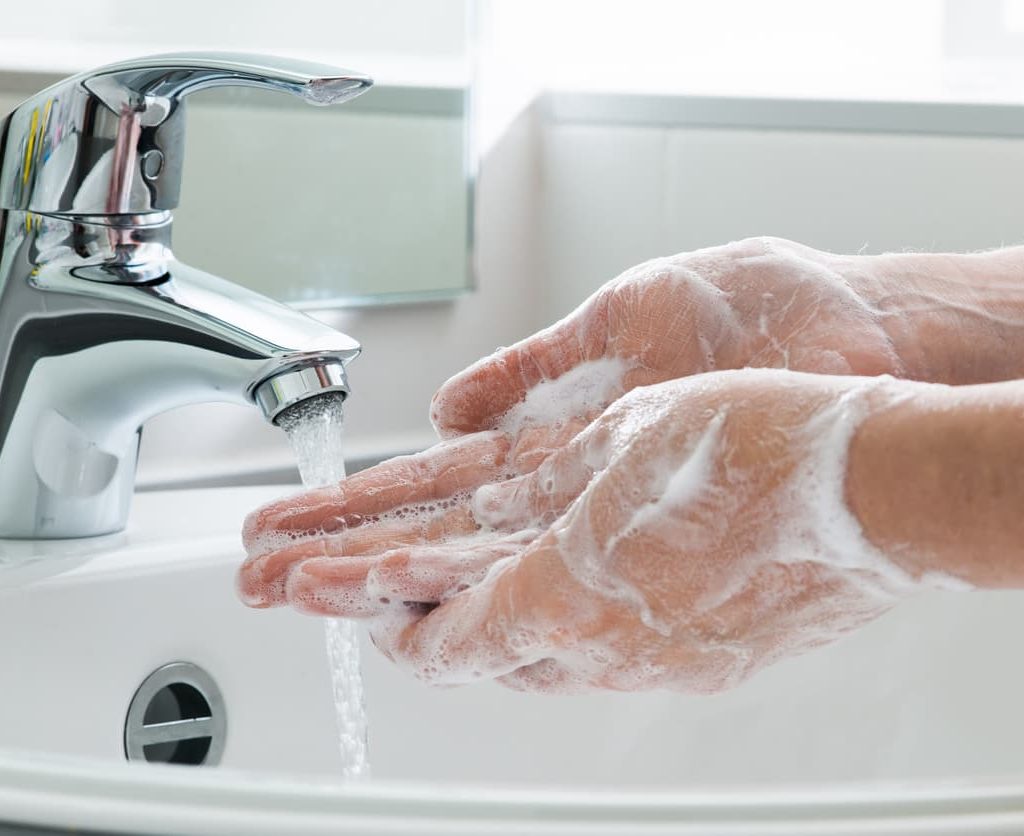 Soapy Hands Being Washed