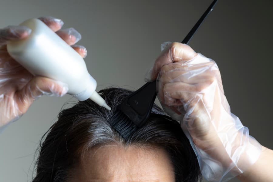 A Woman Dyes Her Hair