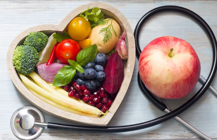 Healthy food in a heart-shaped bowl