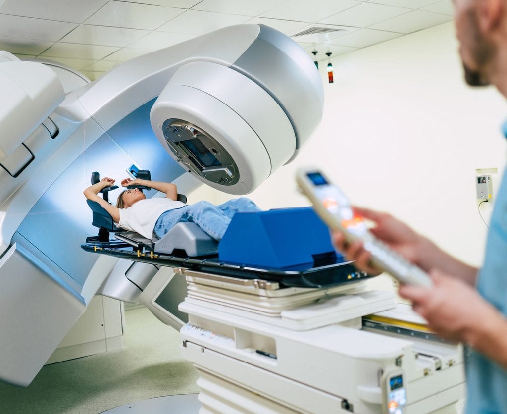 Patient receiving radiation therapy to treat cancer