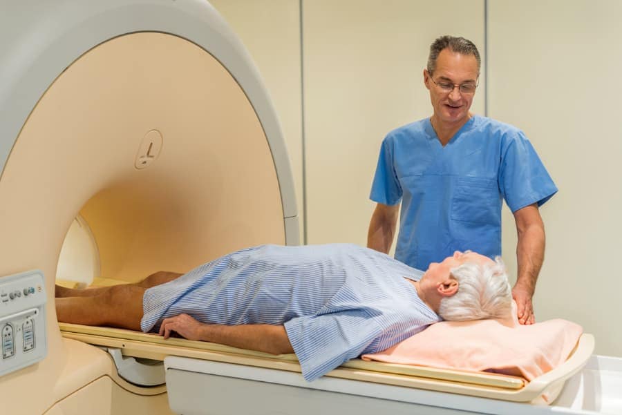 Prostate cancer patient receives instructions from radiologist for MRI