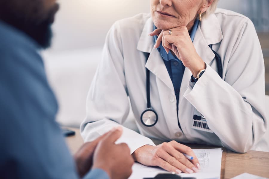 Patient discussing care options with doctor